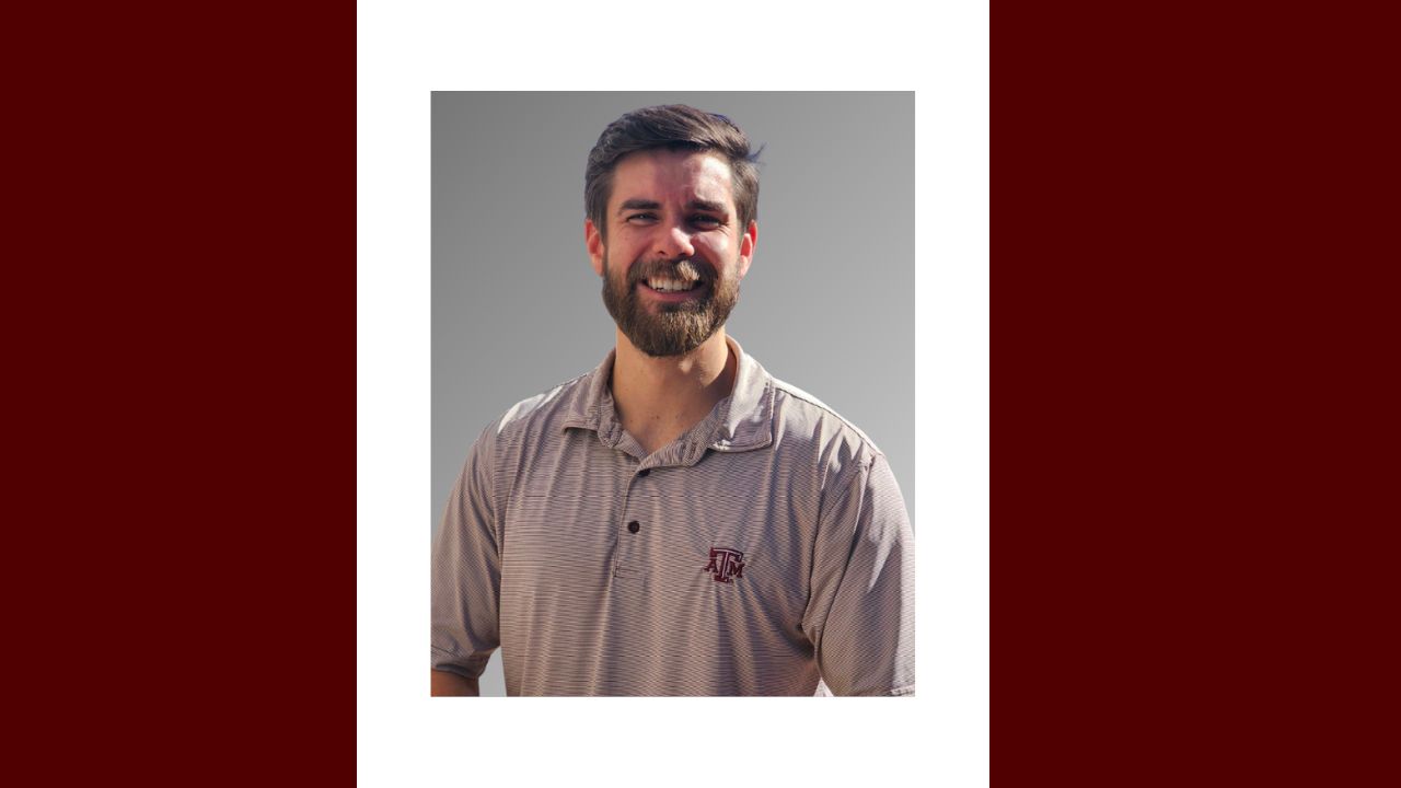 a man with a polo shirt that is smiling